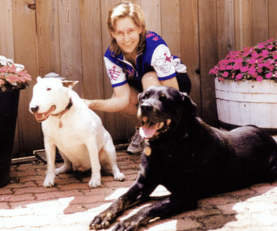 spike-linda-on-deck-with-labrador-Horz dog recovered from coonhound symdrome